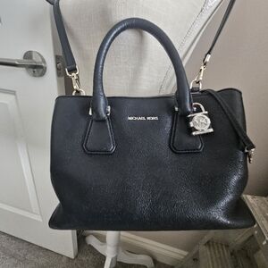 Pre loved leather Michael Kors gold lock purse